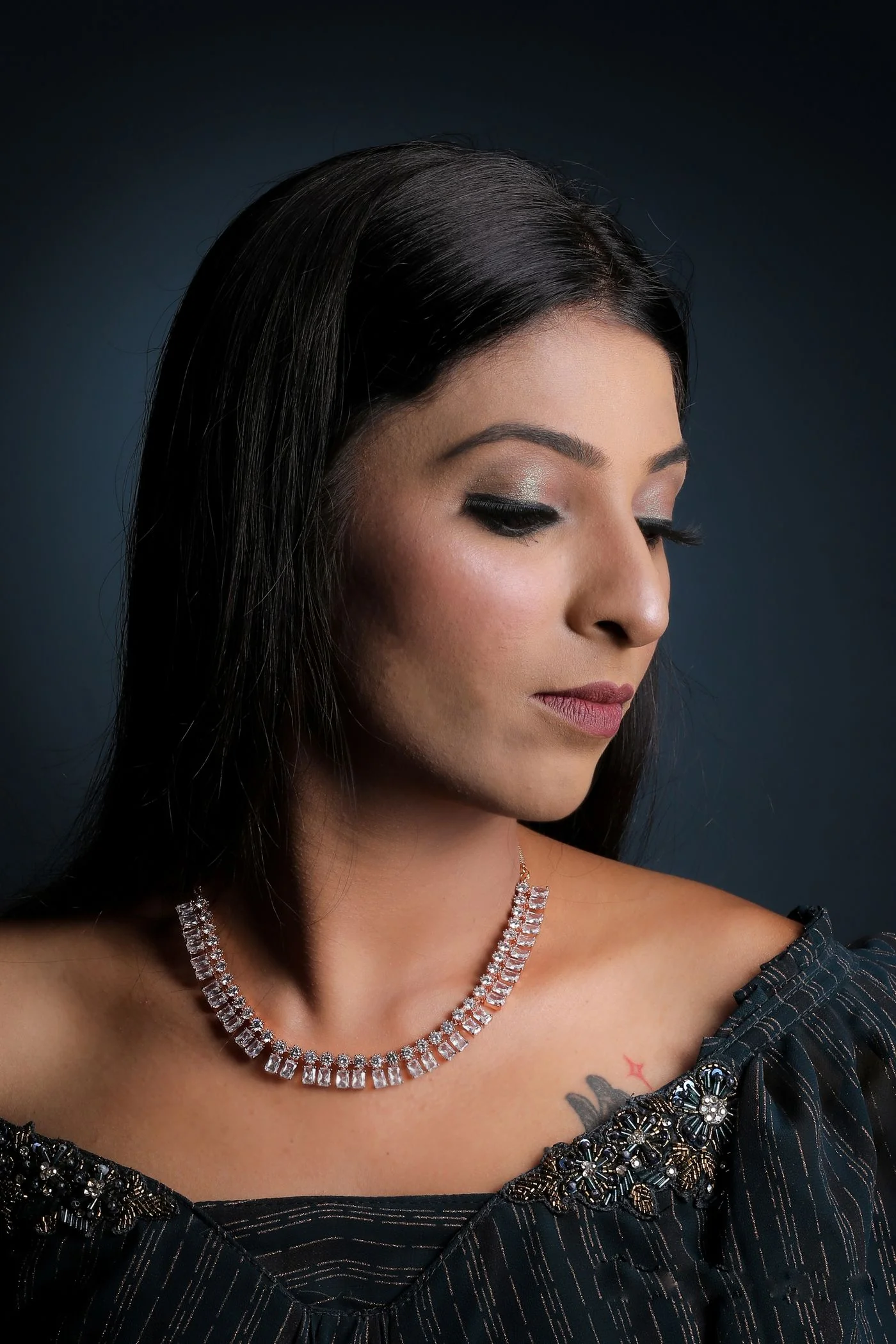 Diamond necklace worn in studio light